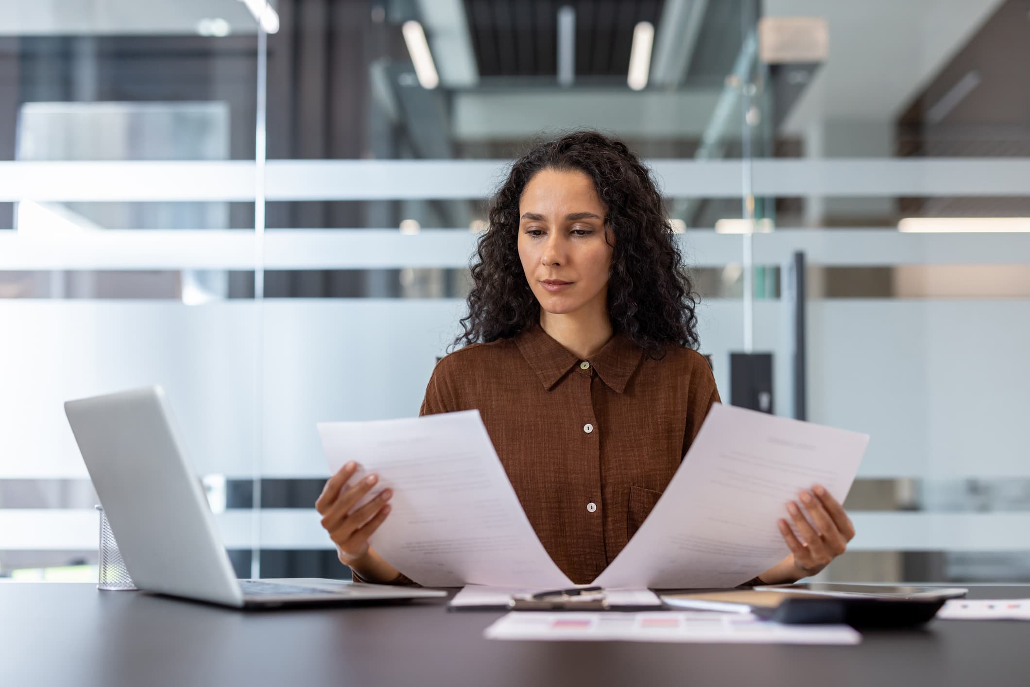 A recruiter comparing candidates’ CVs